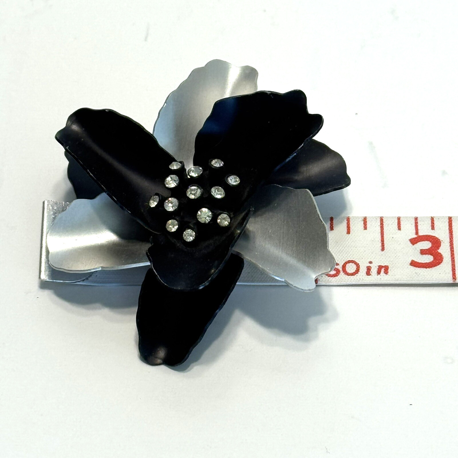 Vintage Black and Silver Flower Brooch Enamel Layered Petals Clear Rhinestones