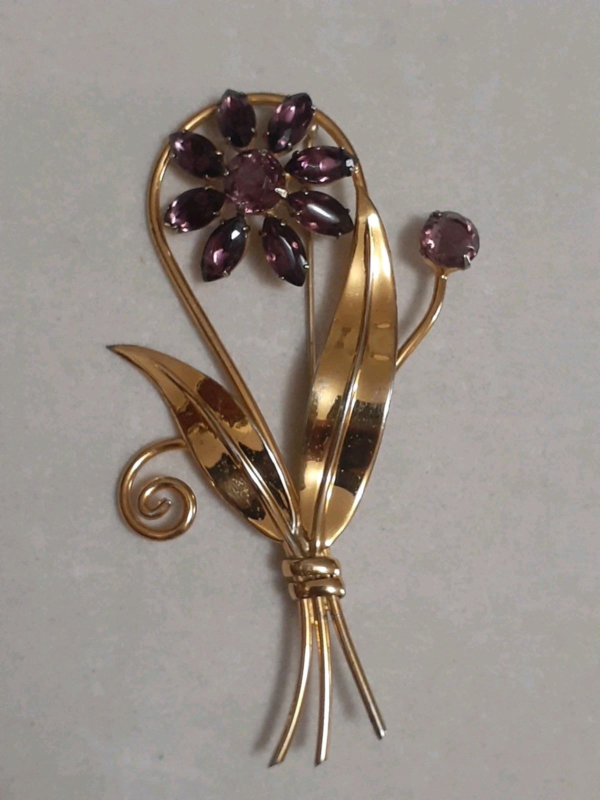 Sterling silver gold plated prong set purple glass flower & stem leaf brooch