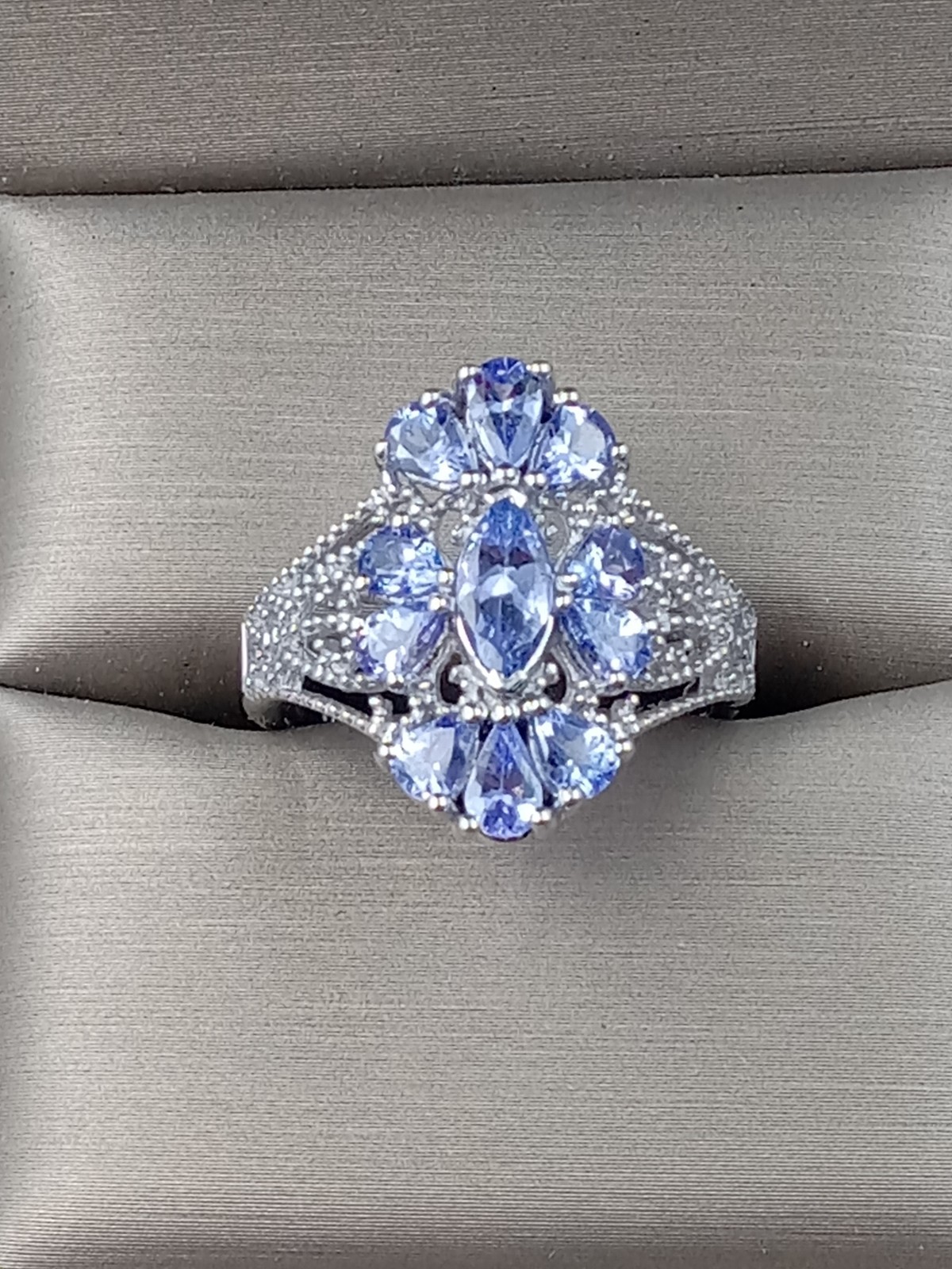 Sterling Silver Size 8 Ring w. Intricate multiple Iolite Gemstones Setting