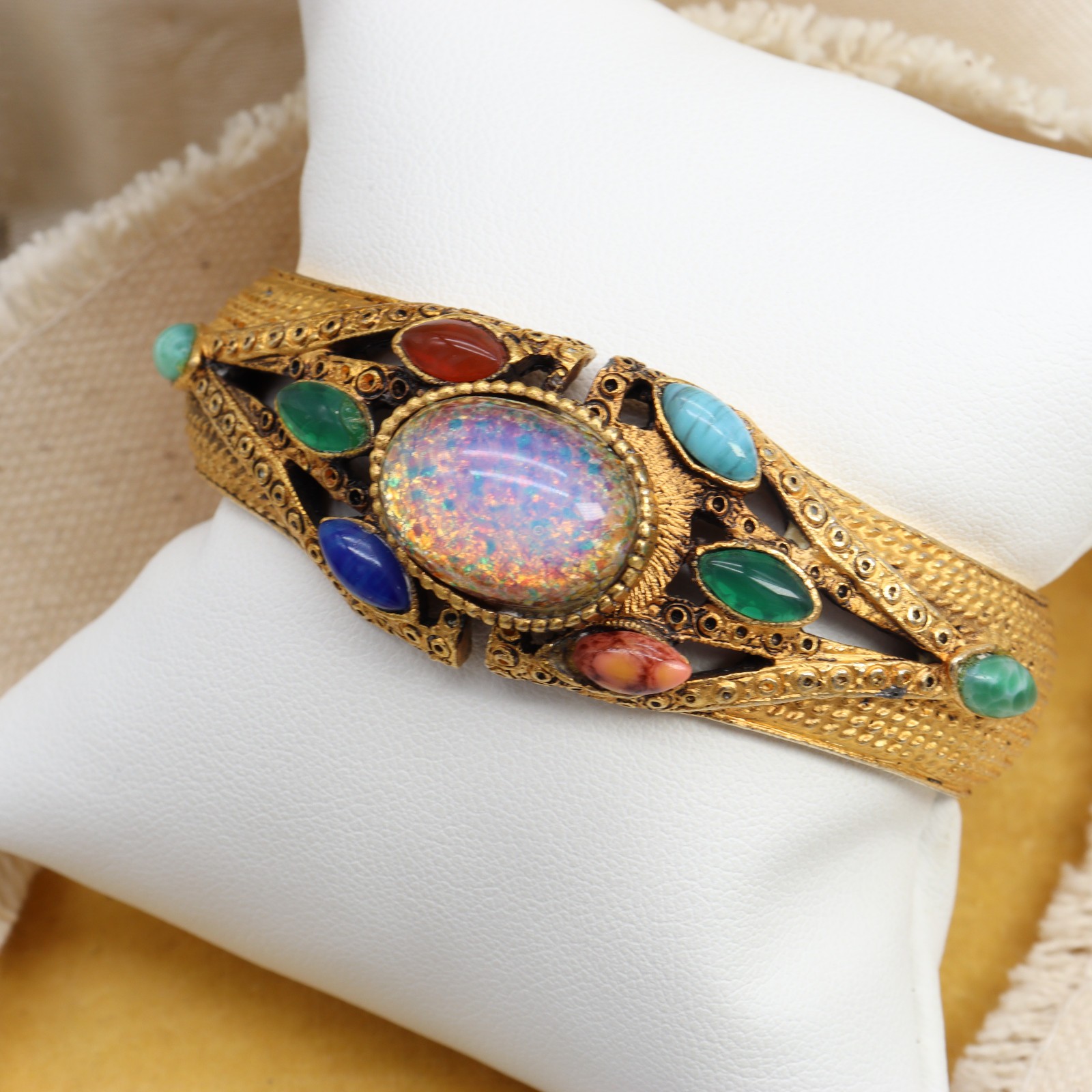 Vtg DESIRE Faux Opal Cabochon Clamper Bracelet Glass Gold Tone Hinged Pink Blue