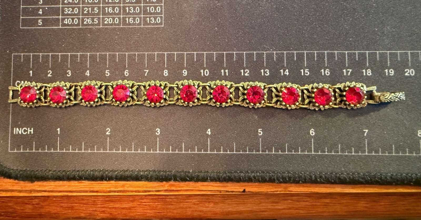 Bronze Tone Ruby Red Rhinestone Bracelet Fold Over Clasp Unsigned Size 7