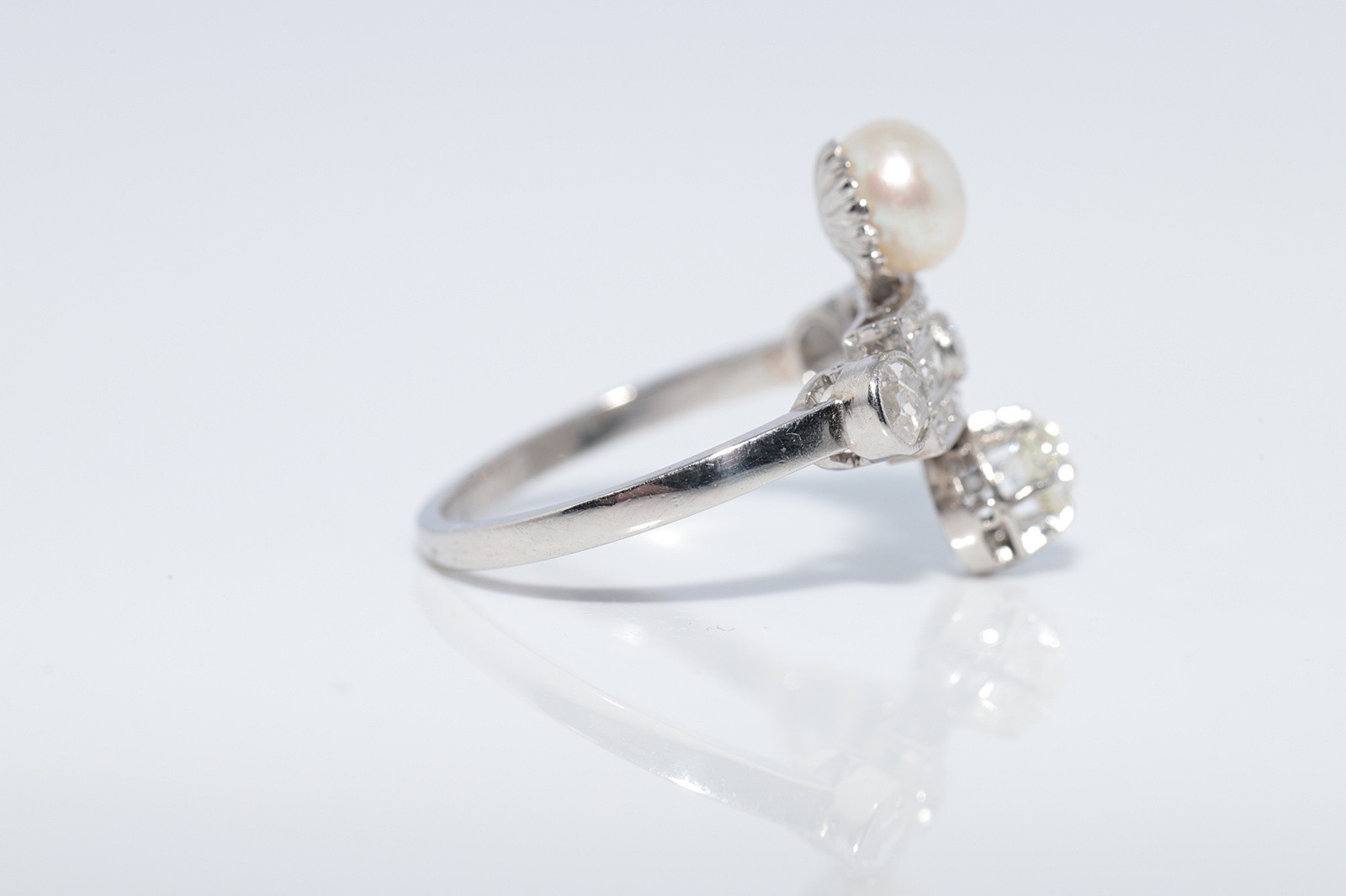 Antique Circa 1920s Platinum Art Deco Natural Diamond And Pearl Decorated Ring