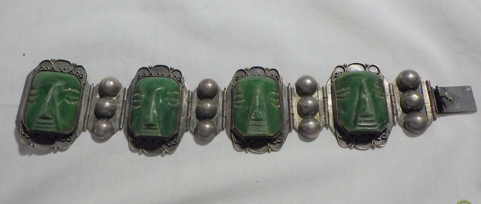 MEXICO STERLING BRACELET W, CARVED JADE INTRICATE AZTEC WARRIOR FACE 76 GRAMS