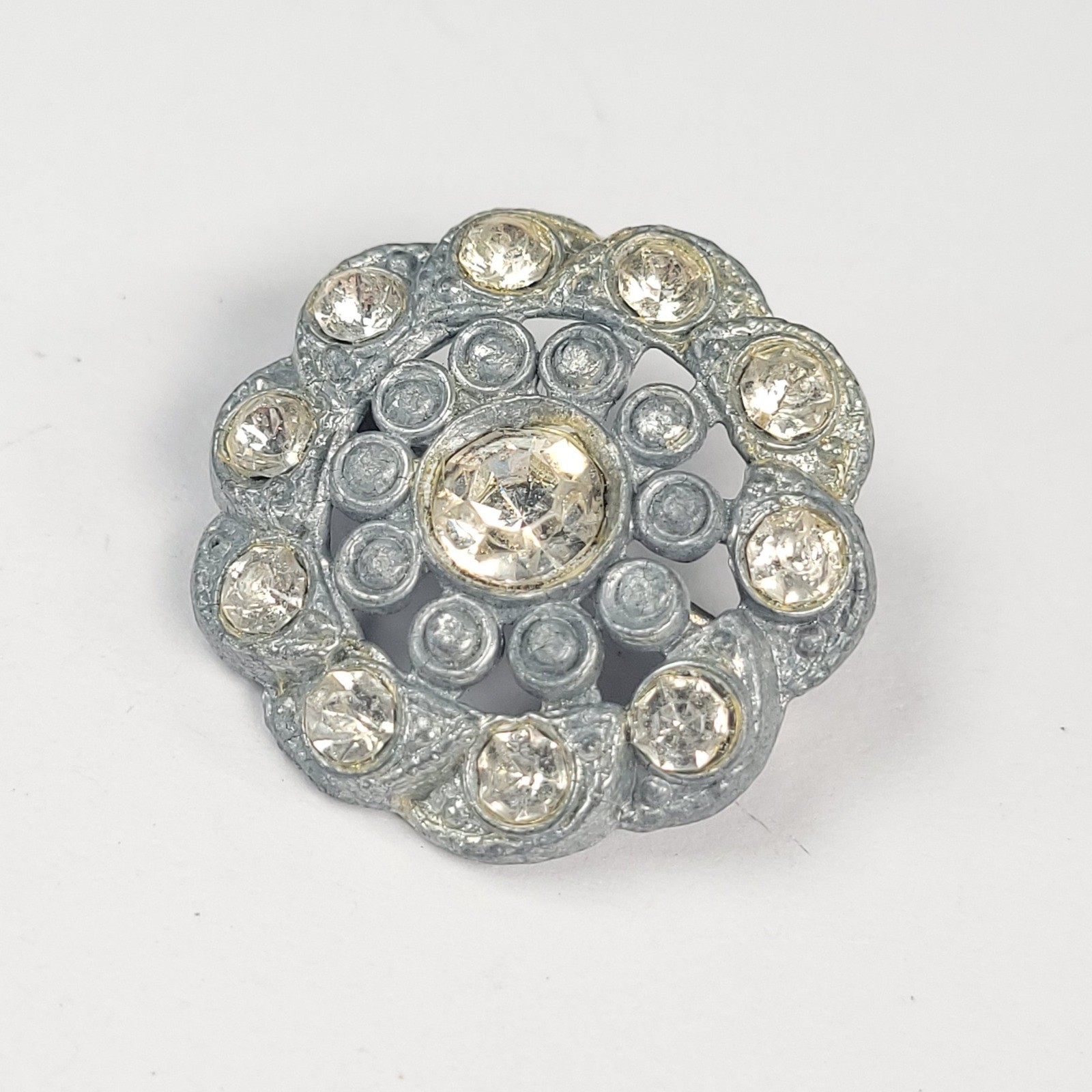 Vintage Small Rhinestone Pot Metal Brooch Silver Tone Floral Rosette Pin GG1