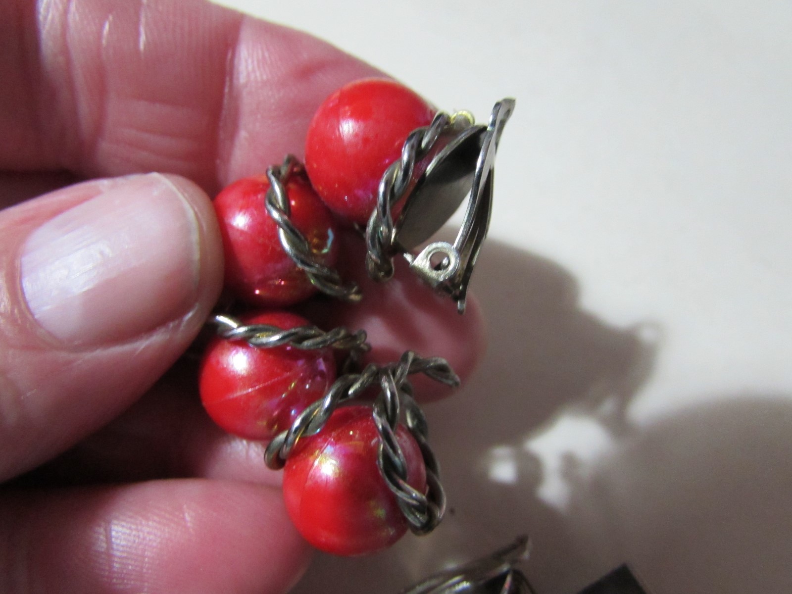 VINTAGE goldtone clip earrings almost 1 1/2″ long red bead half hoop