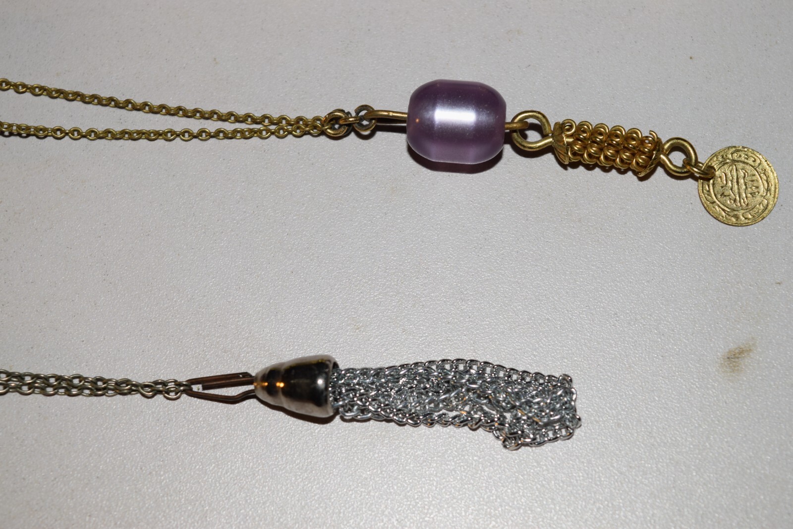 Vintage to now lot of 4 plastic beaded necklaces not sure what the 2 short ones