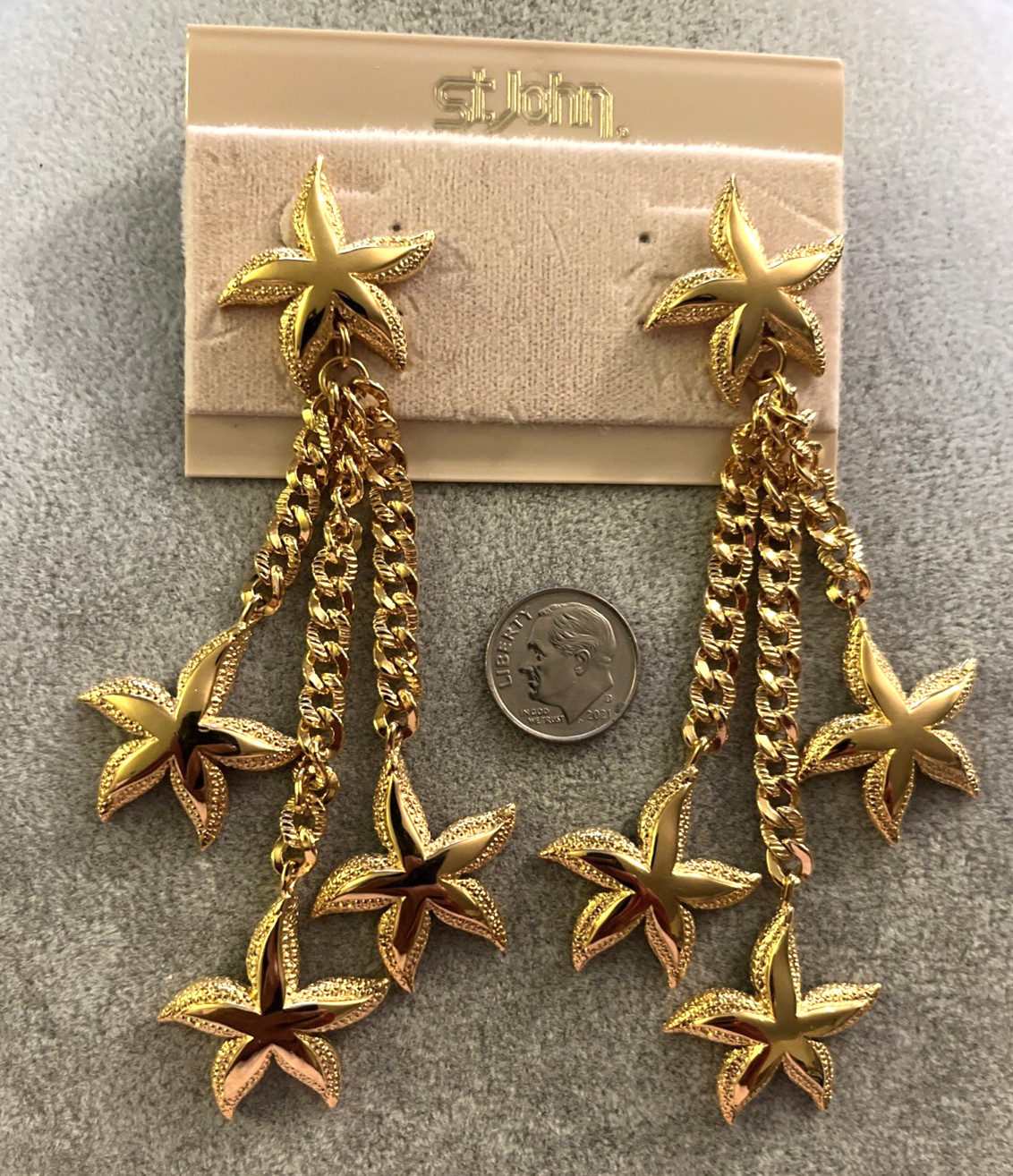 ST. JOHN Gold Plated Dangling Stars Star Fish Post Earrings New on Card 4.25″