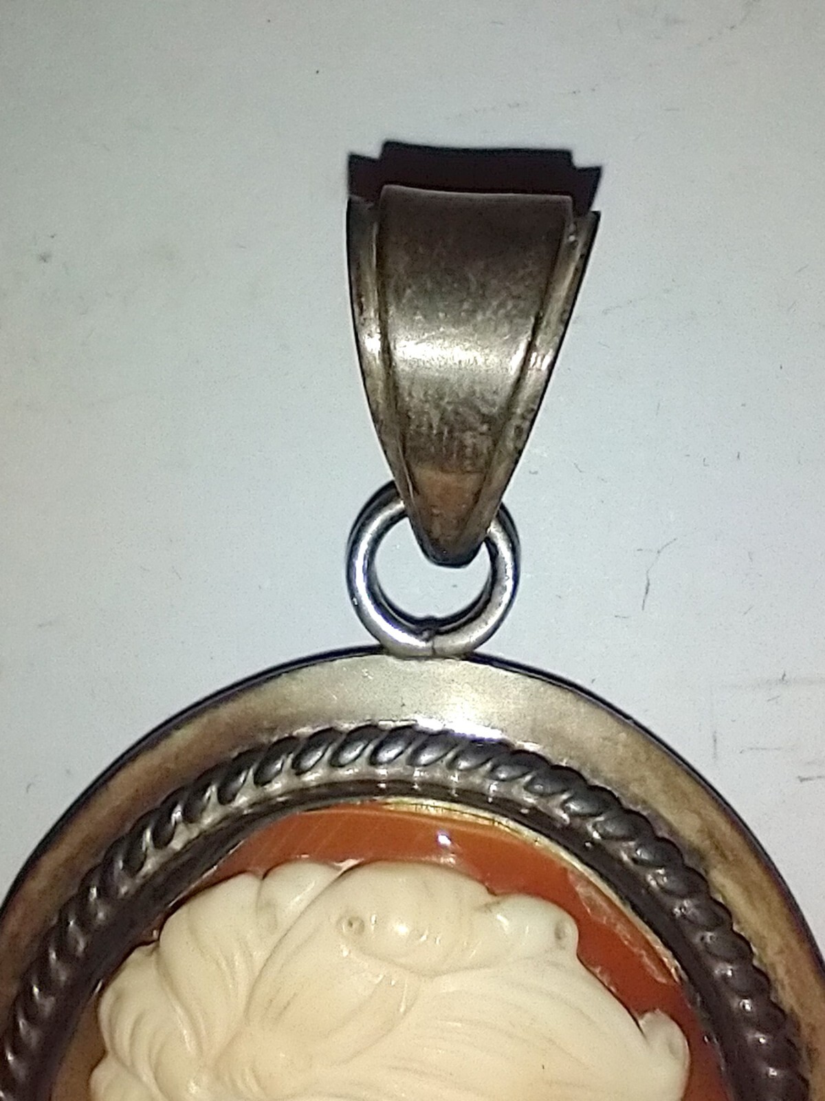 Old Cameo pendant 1.5 x 2 inches Almost looks like she has two faces