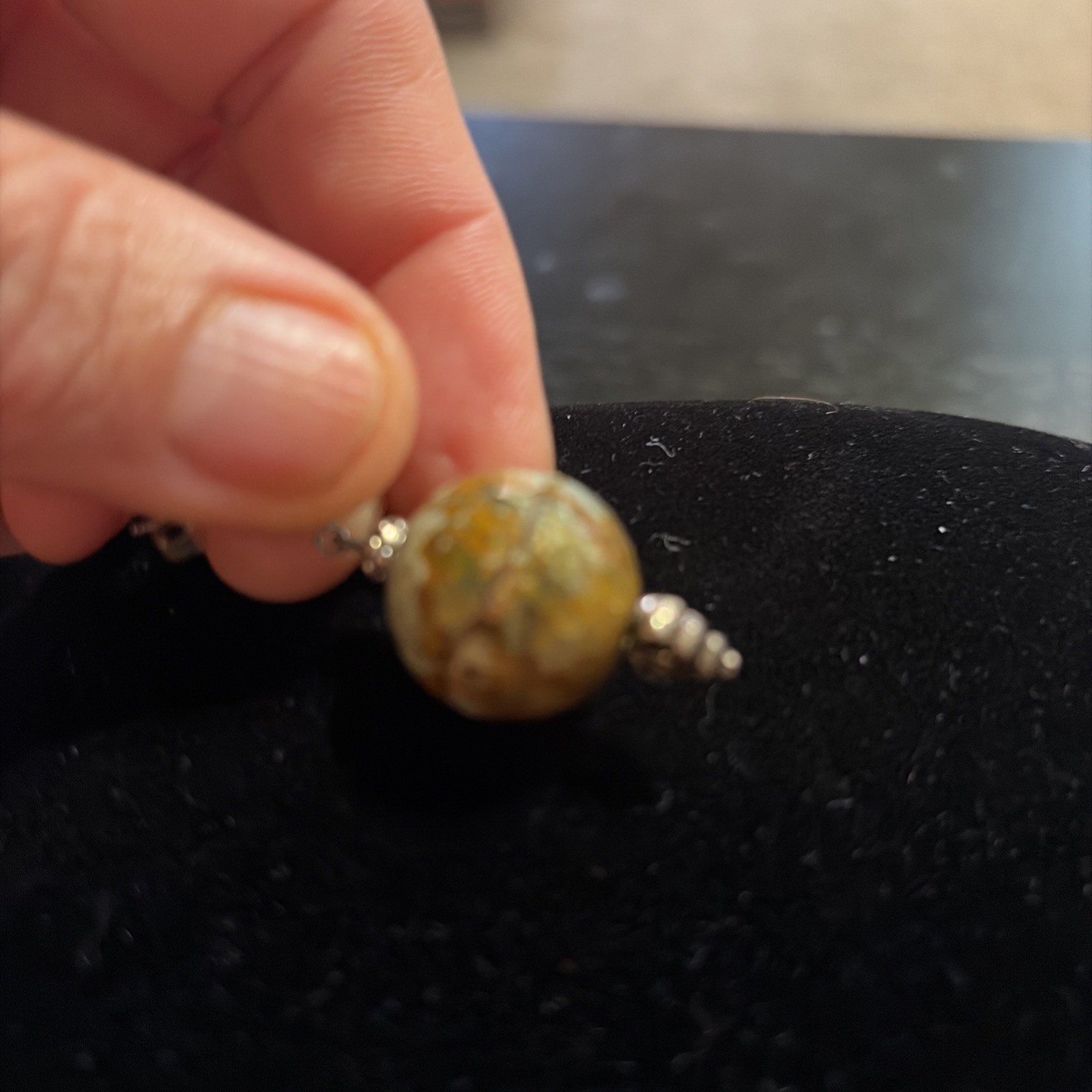Fauceted petrified wood earth tone beaded pierced ,sterling posts and accents