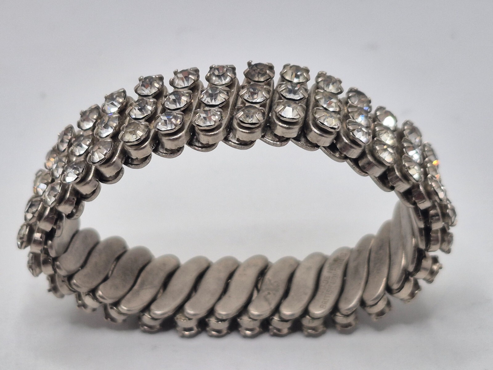 Silver Tone With White Rhinstone Stretch Bracelet “MADE IN BRITISH HONG KONG”