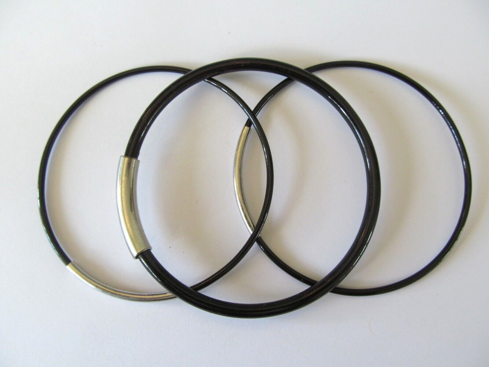 THREE DIFFERENT SHAPES BLACK METAL w/SILVER BAND DESIGNS SLIP ON BANGLE BRACELET