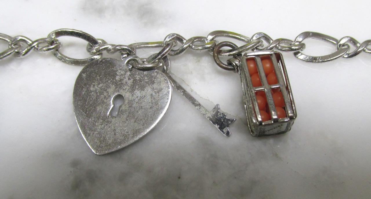 Sterling Silver Charm Bracelet w/ 5 Charms; 1 Danecraft 7-1/4″ ~ 19.5g ~ 9-K600