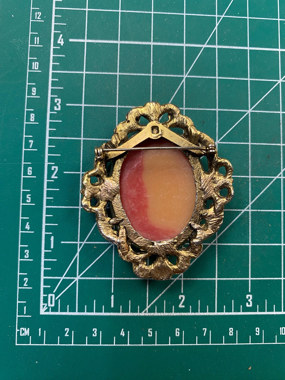 Bronze Tone Brooch with Pink Cameo