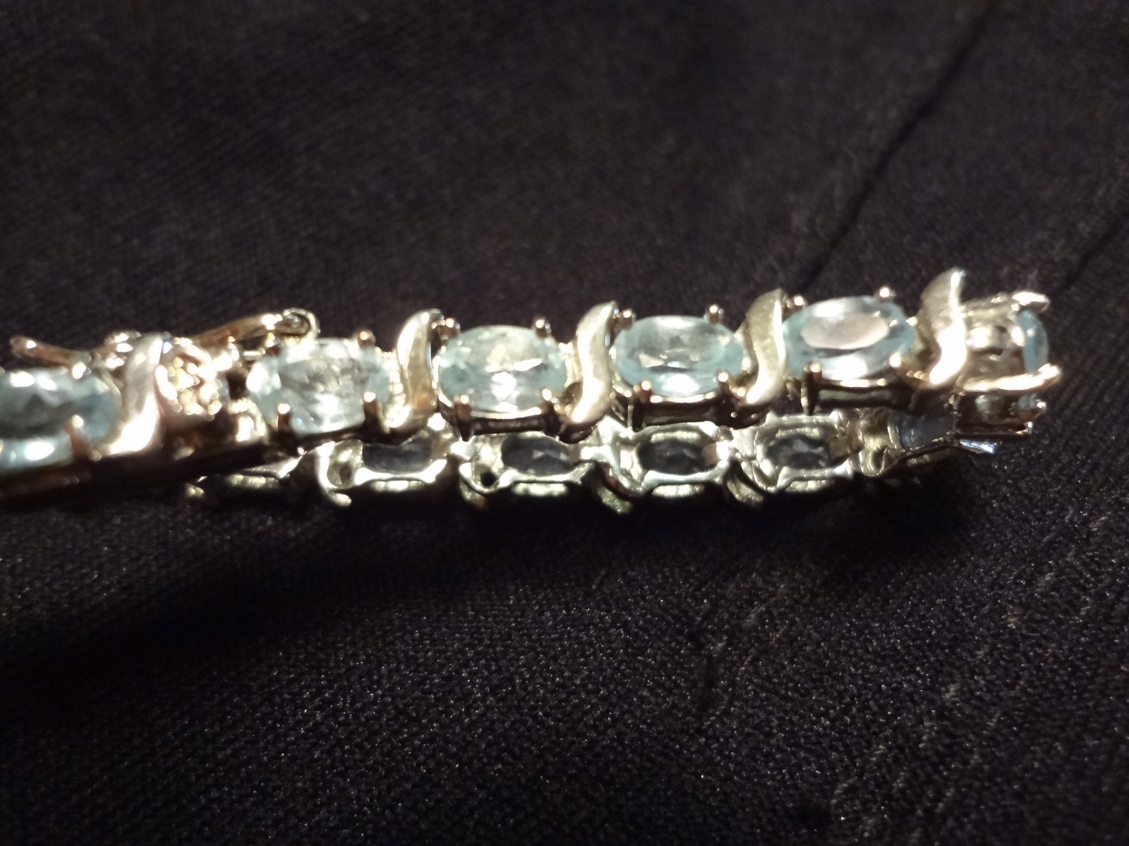 #48-DBJ-925 STERLING SILVER BRACELET LOADED WITH BEAUTIFUL STONES