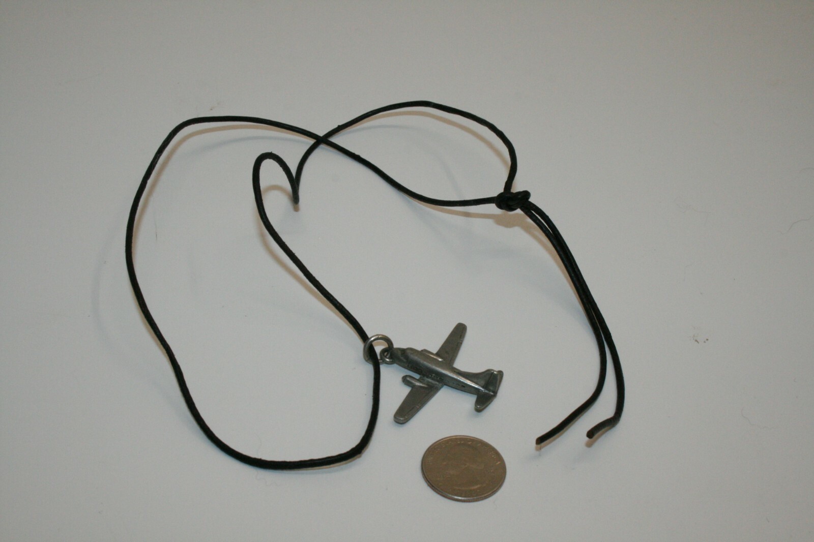 VINTAGE (JIM) CLIFT SIGNED PEWTER AIRPLANE PLANE CORD NECKLACE