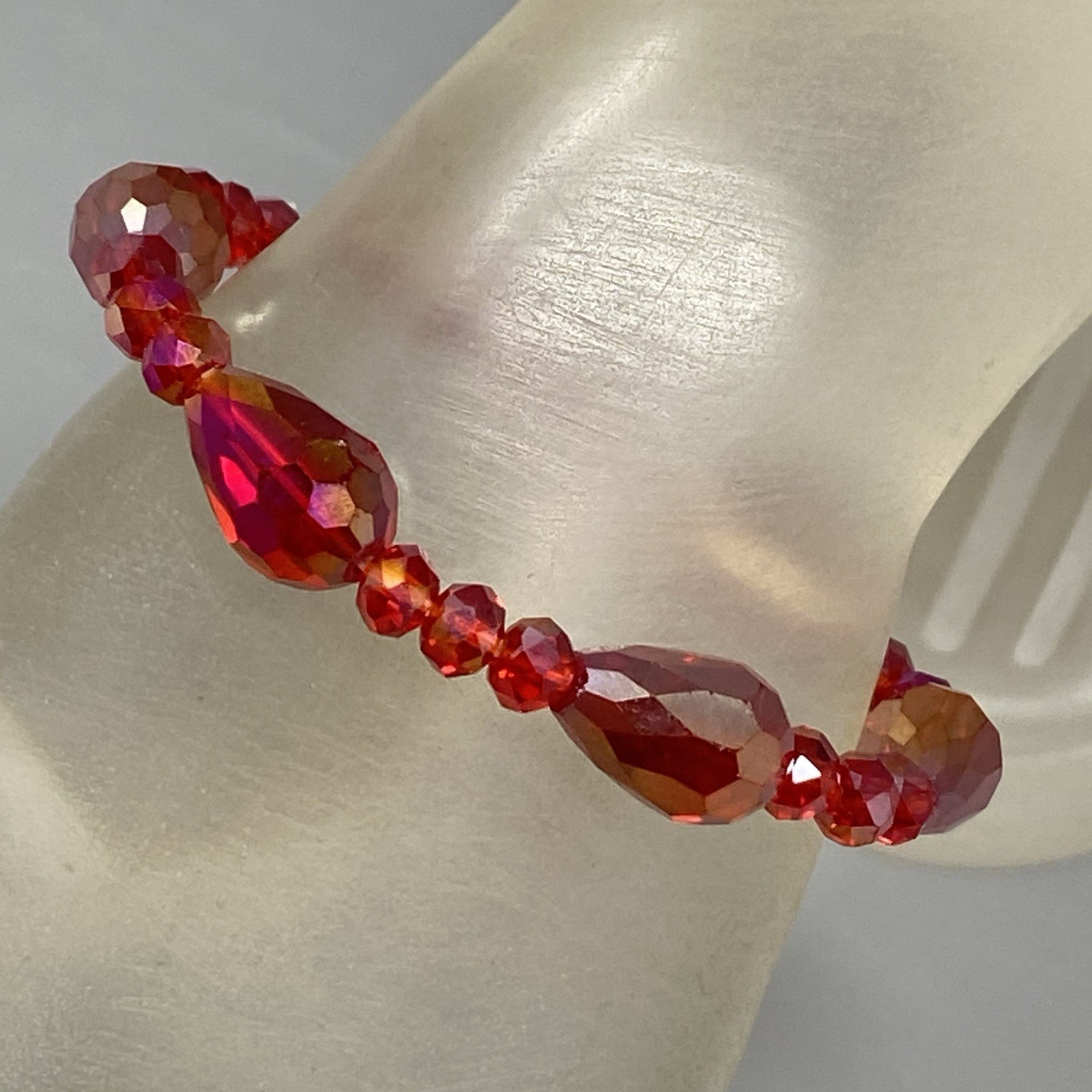 Red Glass Beaded Bracelet Surface Coated Faceted Teardrop Iridescent Stretch 6″