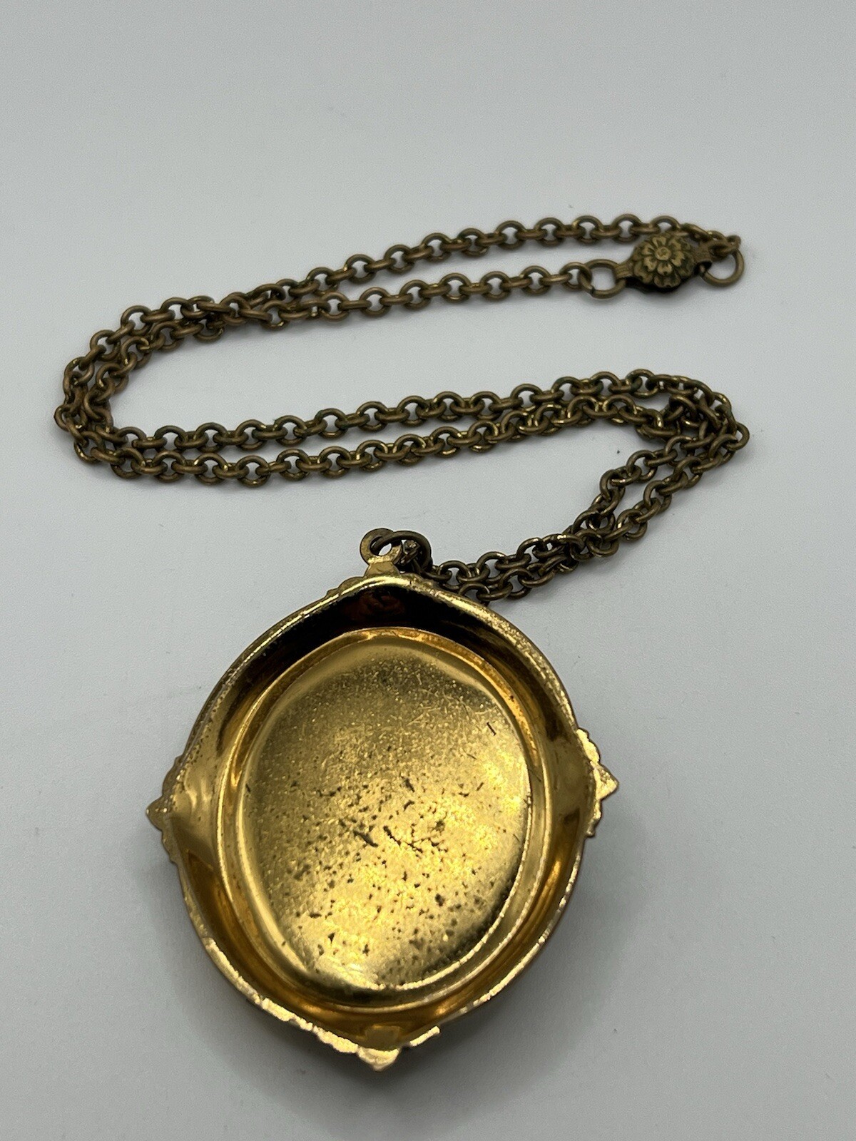 Mother of pearl faux cameo pendant necklace with gold frame and chain