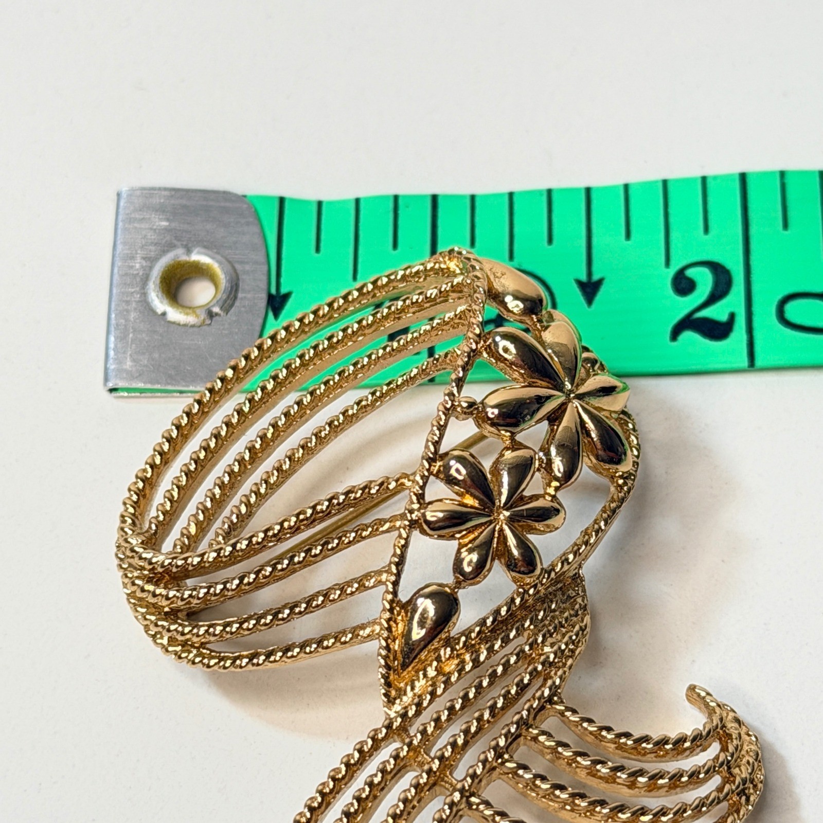 Monet Gold Tone Swirl Ribbon Flower Brooch Vintage Textured Floral Pin