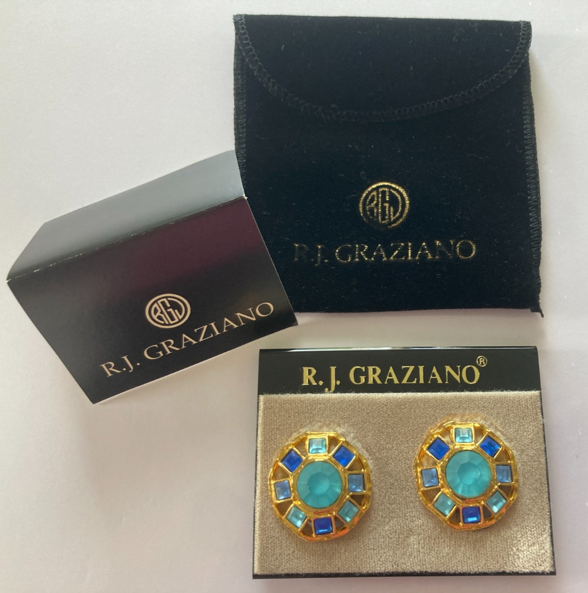 R.J. Graziano Clip on Earrings Blue Stones in Gold Color Setting