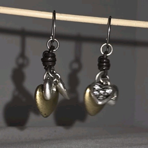 Vintage “Fossil” Two Tone Heart Dangle Pierced Earrings, about 1 inch dangle