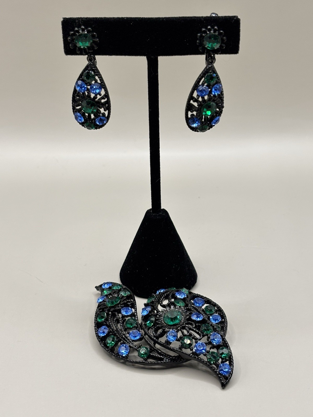 Teardrop & Paisley Blue & Green Rhinestones set in Black Earrings and Brooch