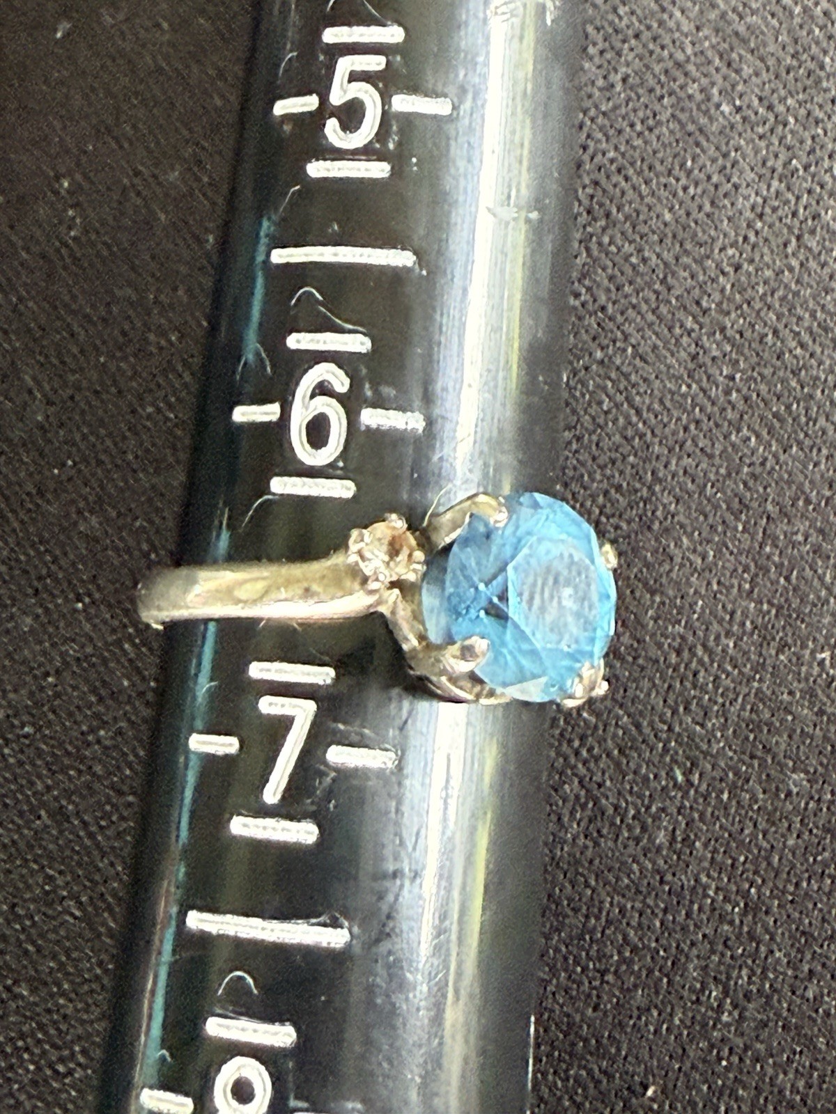 Vintage spring 10k White Gold Blue Topaz Ring.