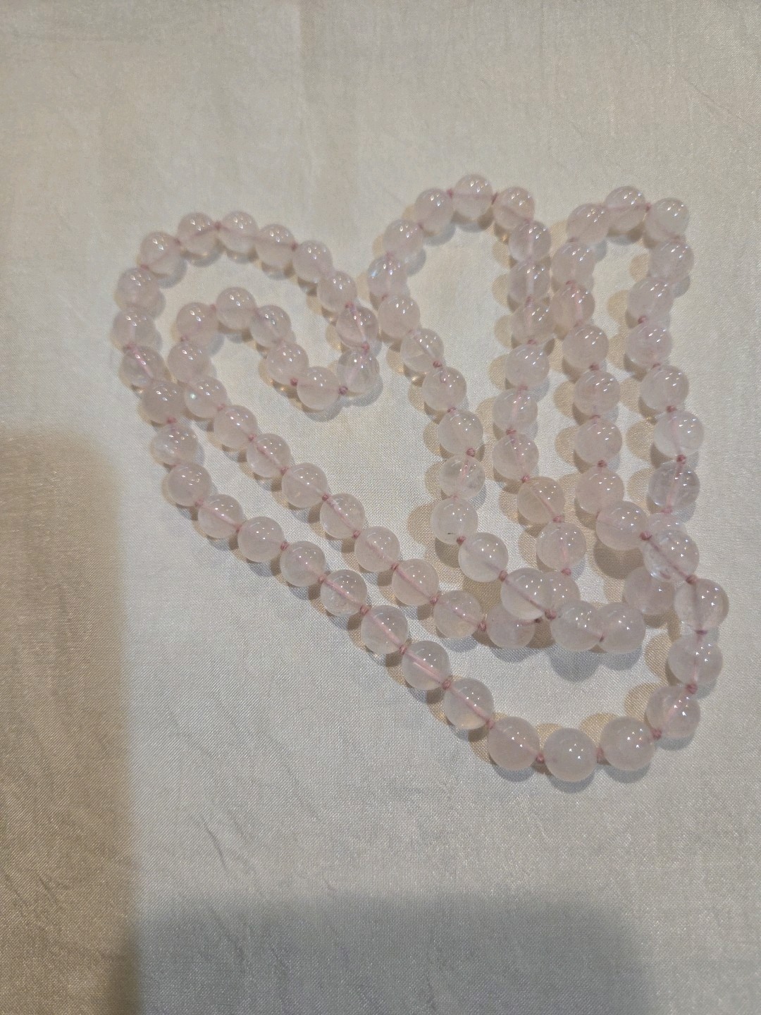 Delicate Vintage rose quartz necklace, continuous strand 31 inches in length.