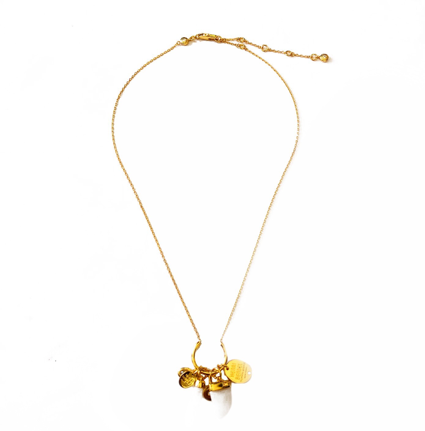 AUTH NEW Henri Bendel GOLD Shark’s Tooth CZ Crystal Charm wtag and Dust Bag RARE