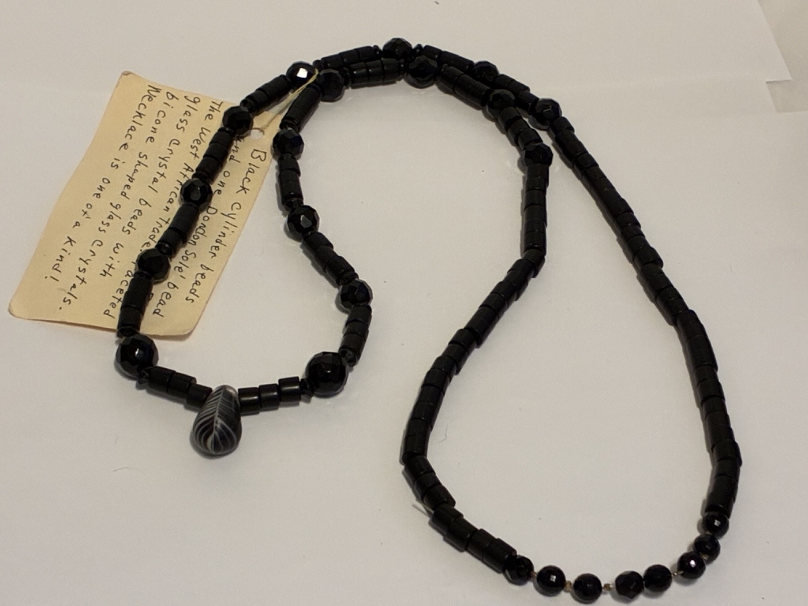 VTG Necklace 34″ Faceted Black Crystal Beads and W. African Trade Dondon Sole