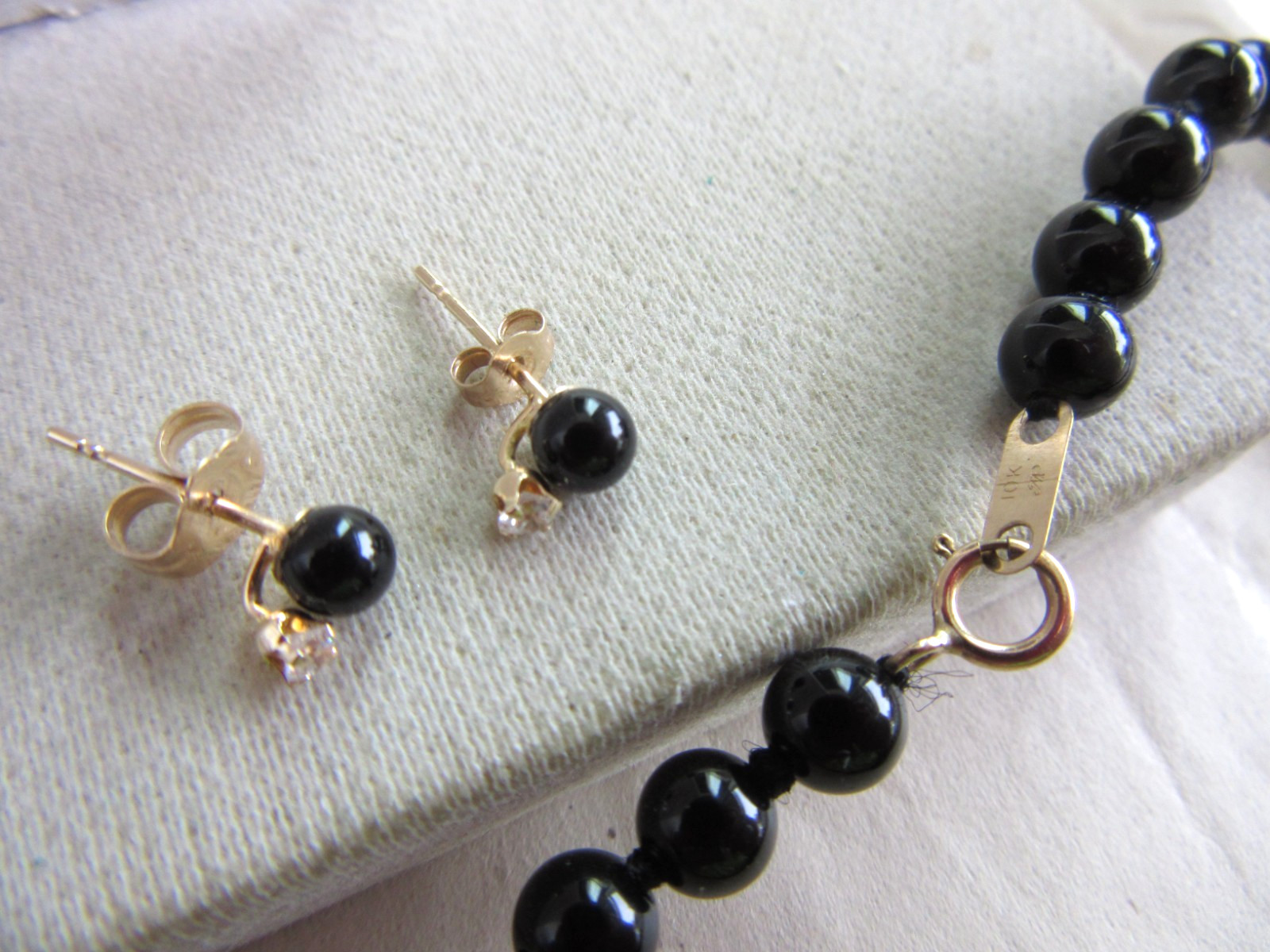 14kt gold Onyx w/diamond accent pierced earrings and Onyx beaded necklace set