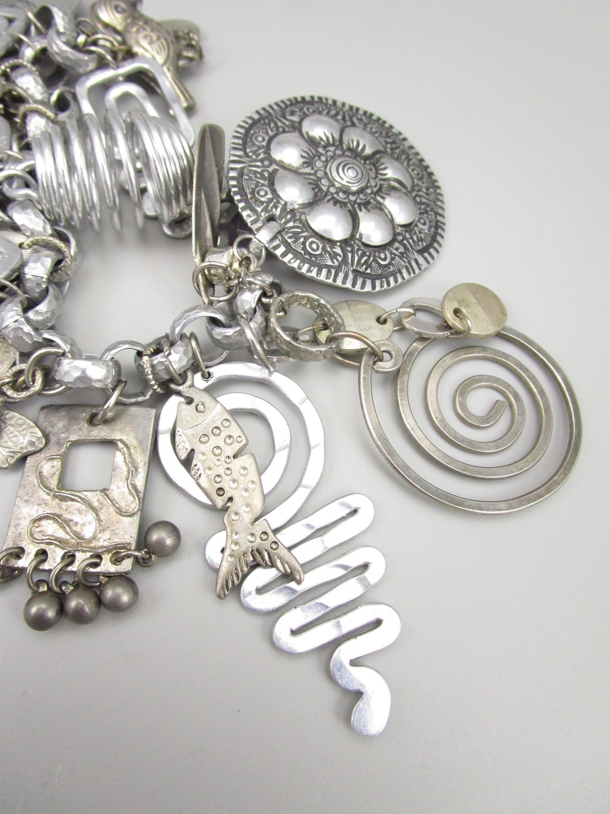 AMAZING 1980’S OVERSIZED ALUMINUM MIXED METAL CHUNKY CHARM BRACELET