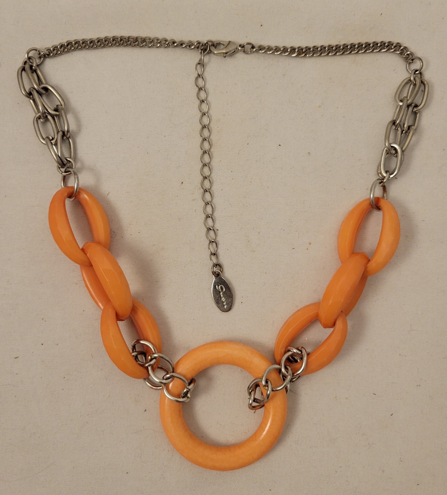Gwen Women’s Silver Tone Necklace with Salmon Colored Large Plastic Links