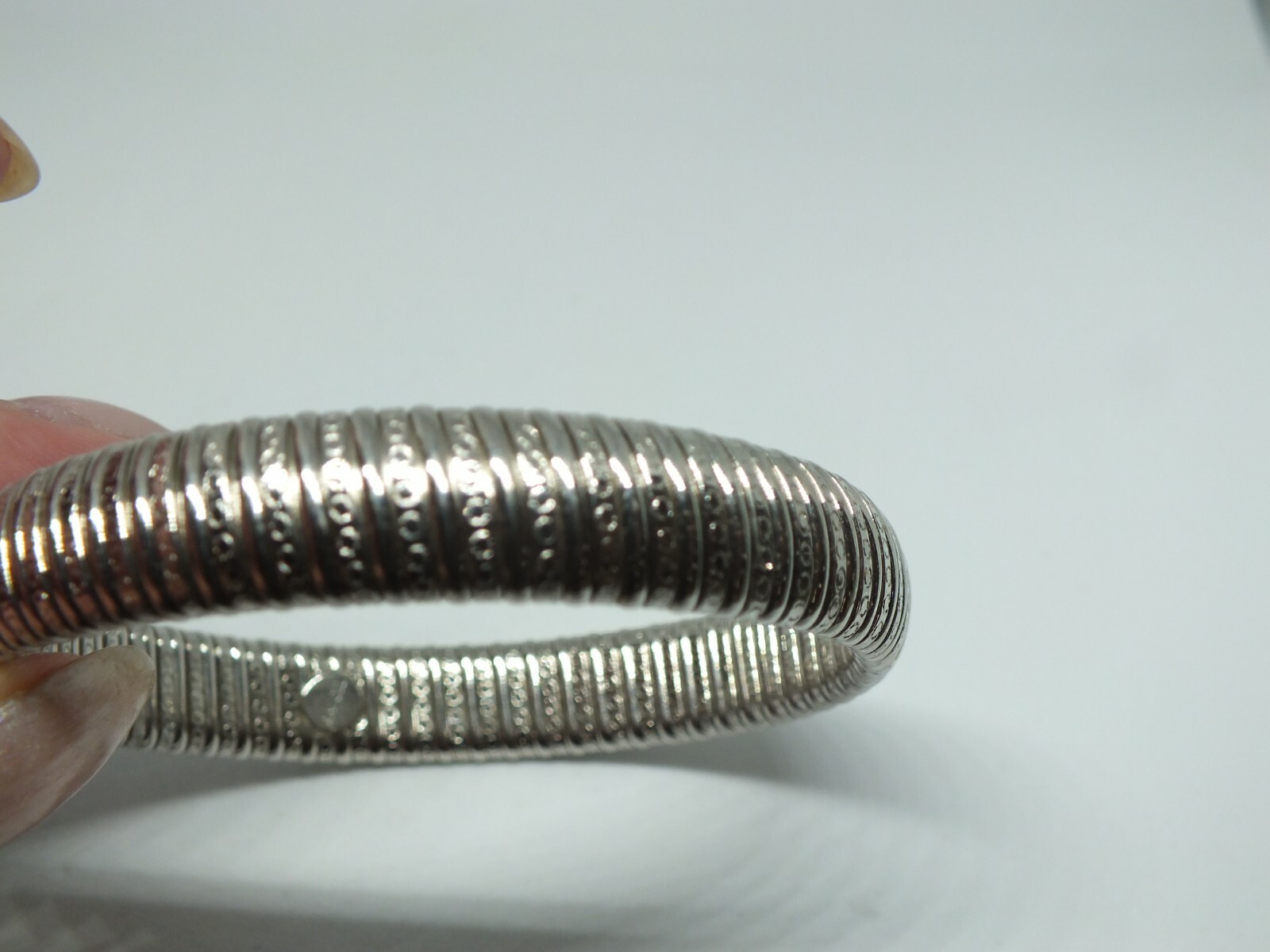 Beautiful Bangle Bracelet Silver Tone Texture Signed AVON 1/2″ W x 2 1/4″ Across