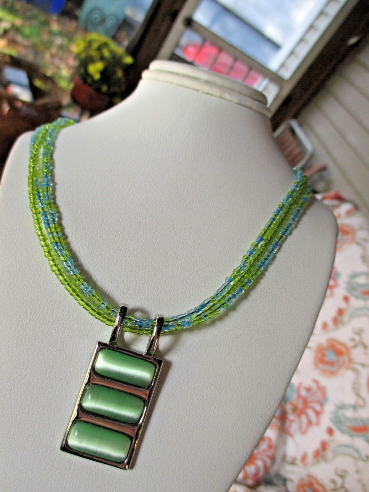 LIA SOPHIA TRIPLE STRAND BEAD AND CAT’S EYE NECKLACE VINTAGE