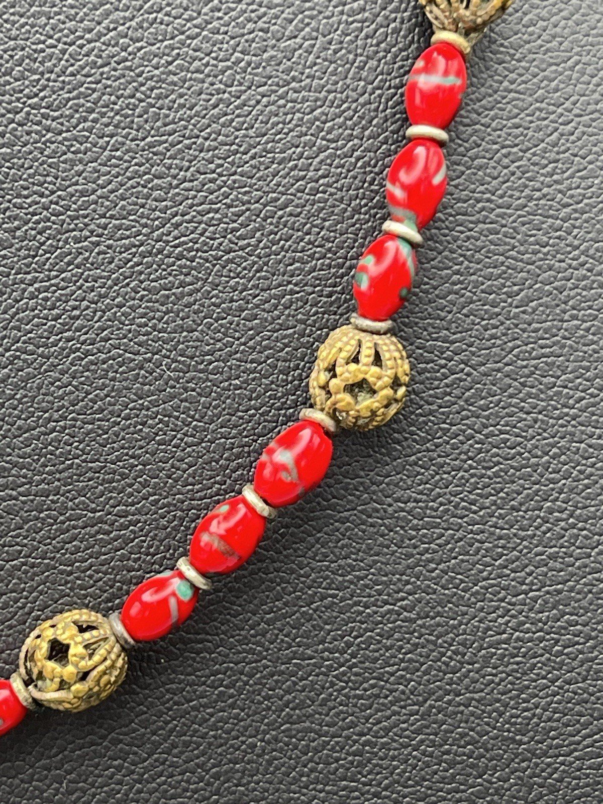 Vintage Red Glass Bead Necklace with Ornate Brass Filigree Accents