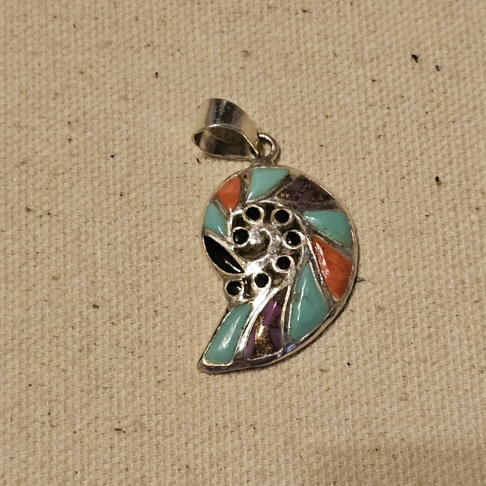 Sterling inlay she’ll pendant w turquoise, coral and purple mohave.