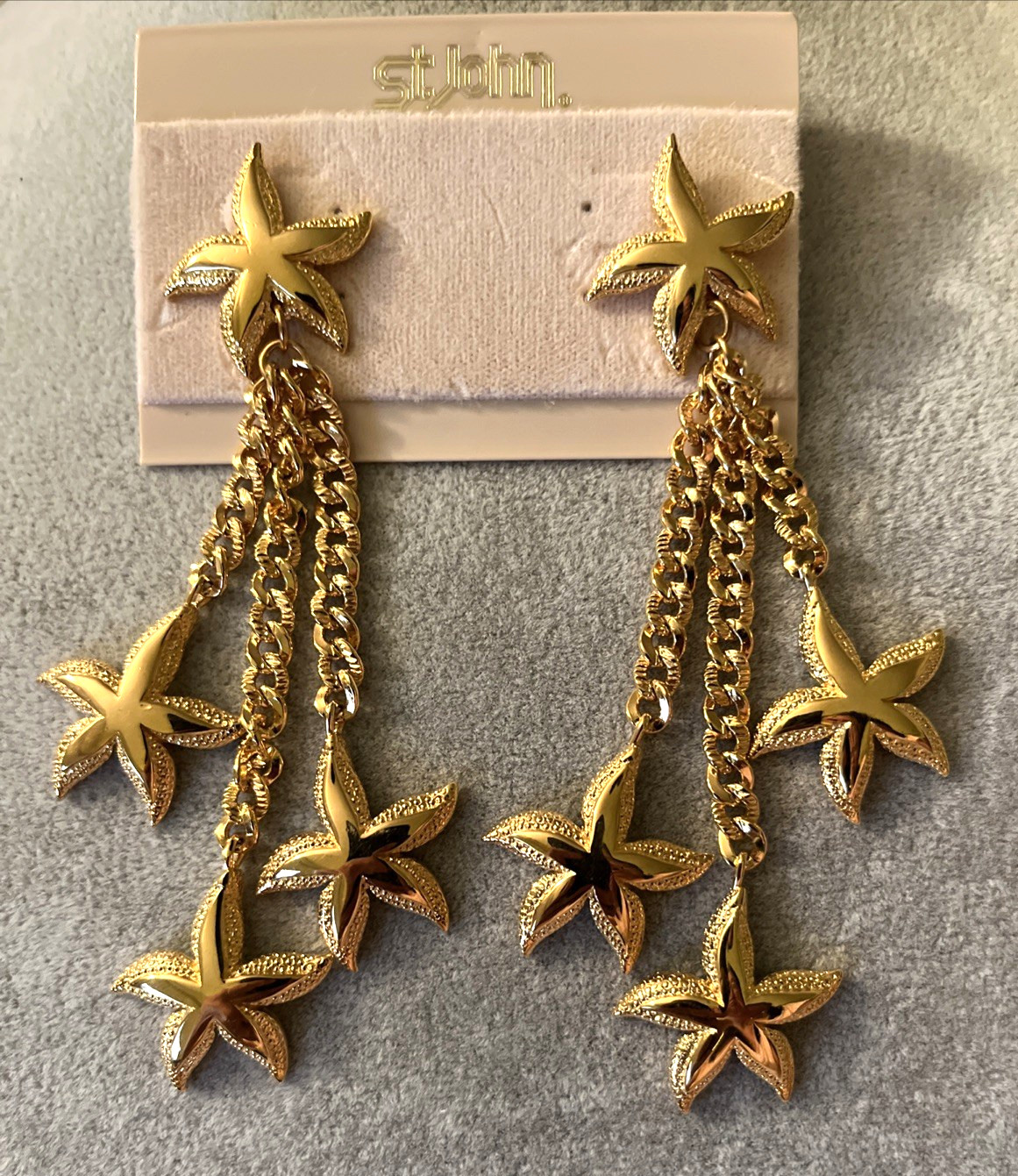 ST. JOHN Gold Plated Dangling Stars Star Fish Post Earrings New on Card 4.25″