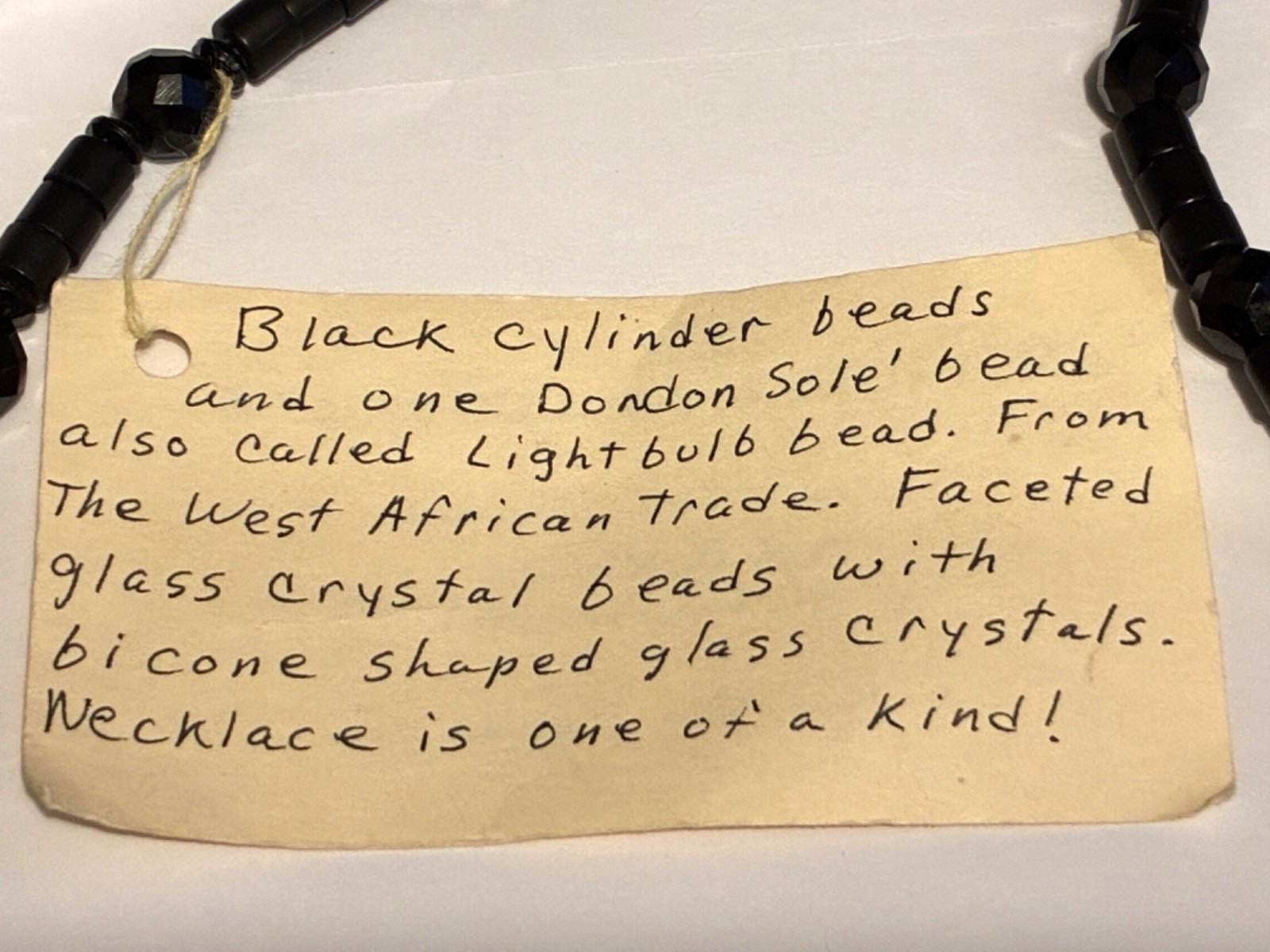 VTG Necklace 34″ Faceted Black Crystal Beads and W. African Trade Dondon Sole