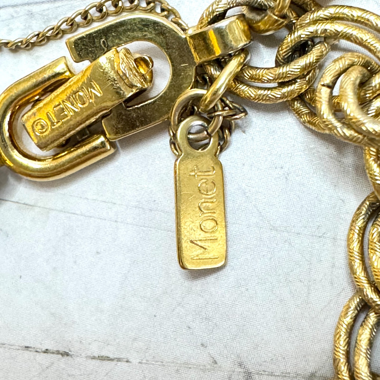 Vintage Monet Charm Bracelet Gold Tone Double Link 6 Charms Globe Kitten Cross