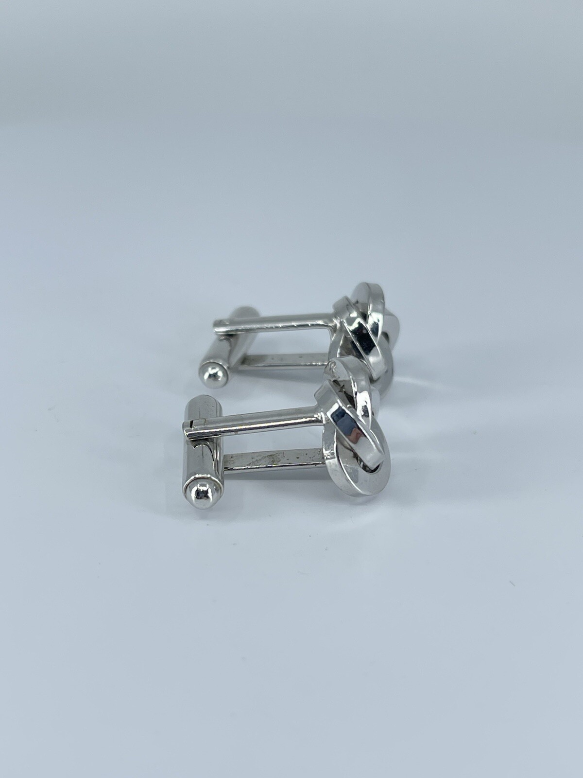 Silver tone Knot cufflinks polished metal knotted design bullet backs 7/8″