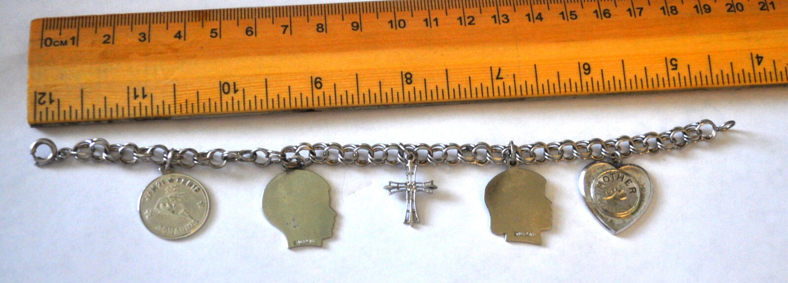 Vintage STERLING CHARM BRACELET cross, son, daughter, mom, aquarius .65 troy oz