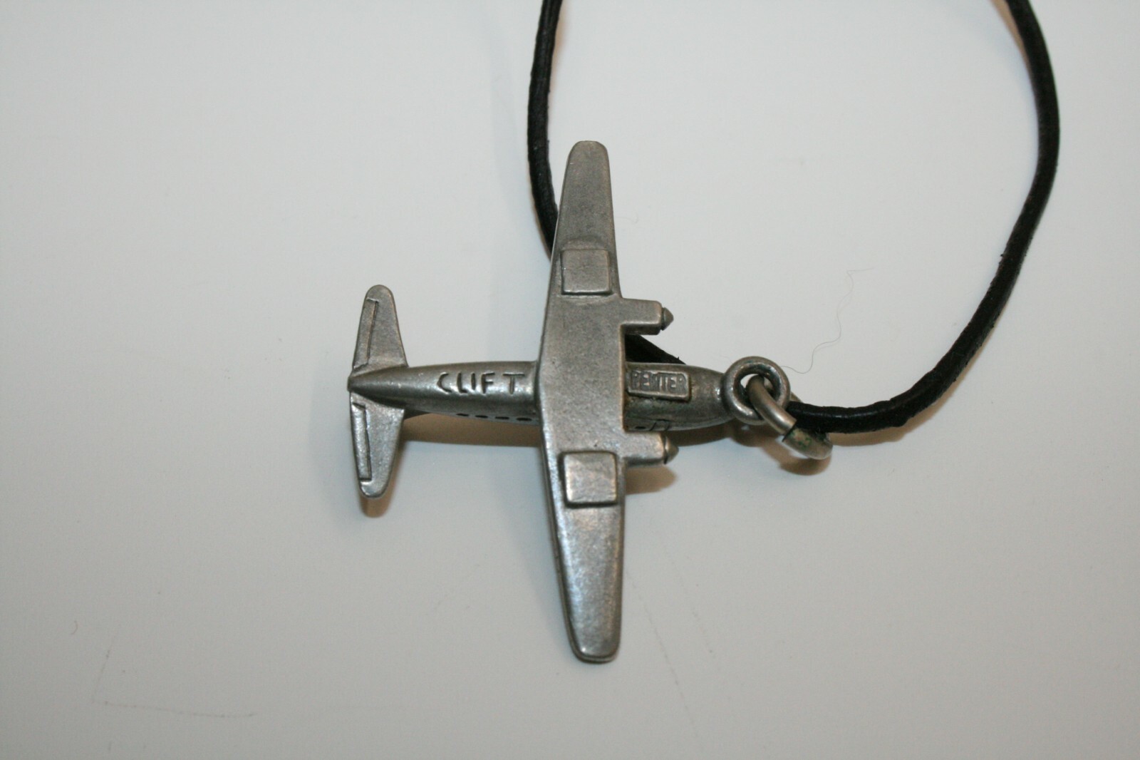 VINTAGE (JIM) CLIFT SIGNED PEWTER AIRPLANE PLANE CORD NECKLACE