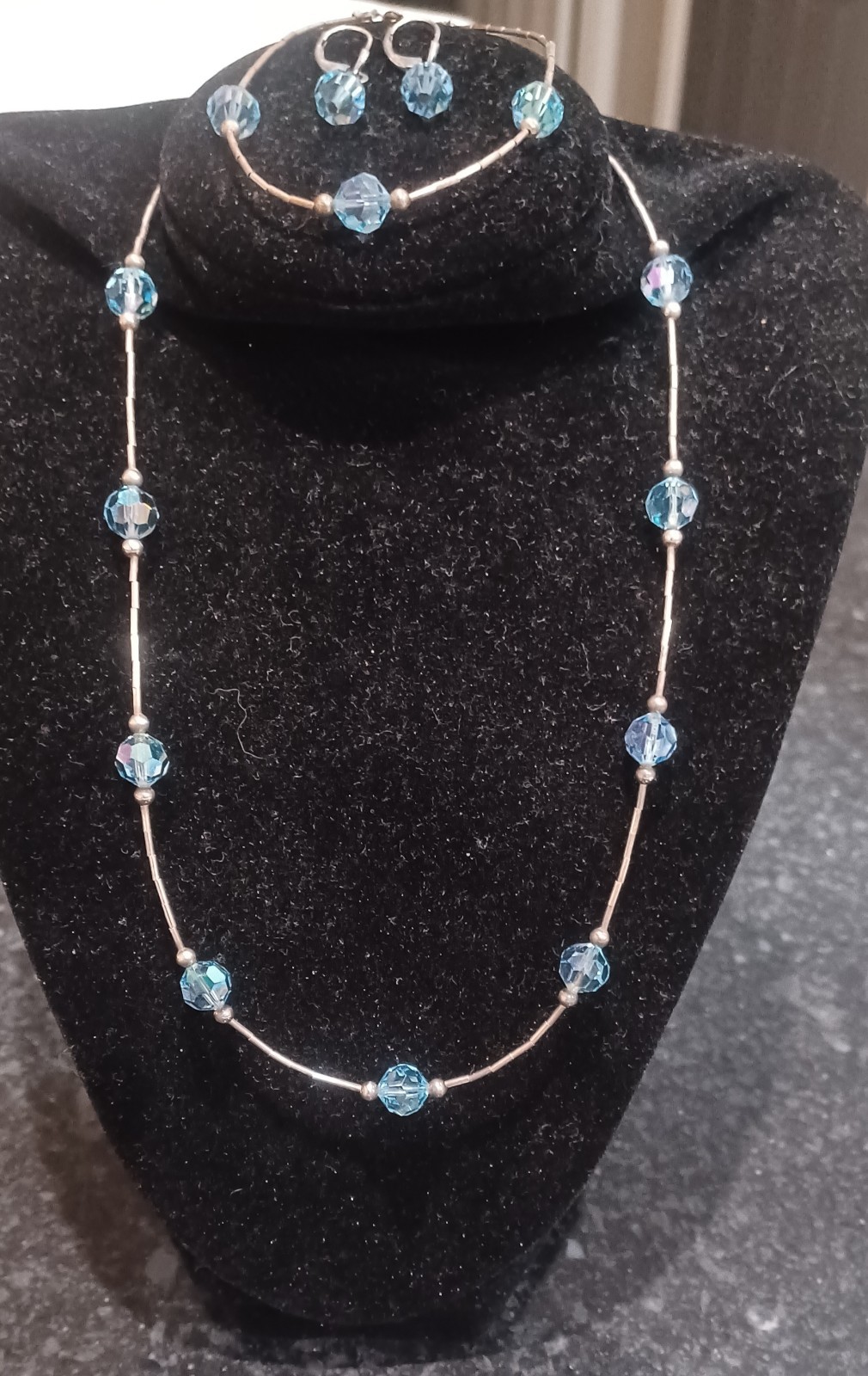 Set Of Silver And Blue Crystal Bead Matching Necklace, Bracelet, And Earrings