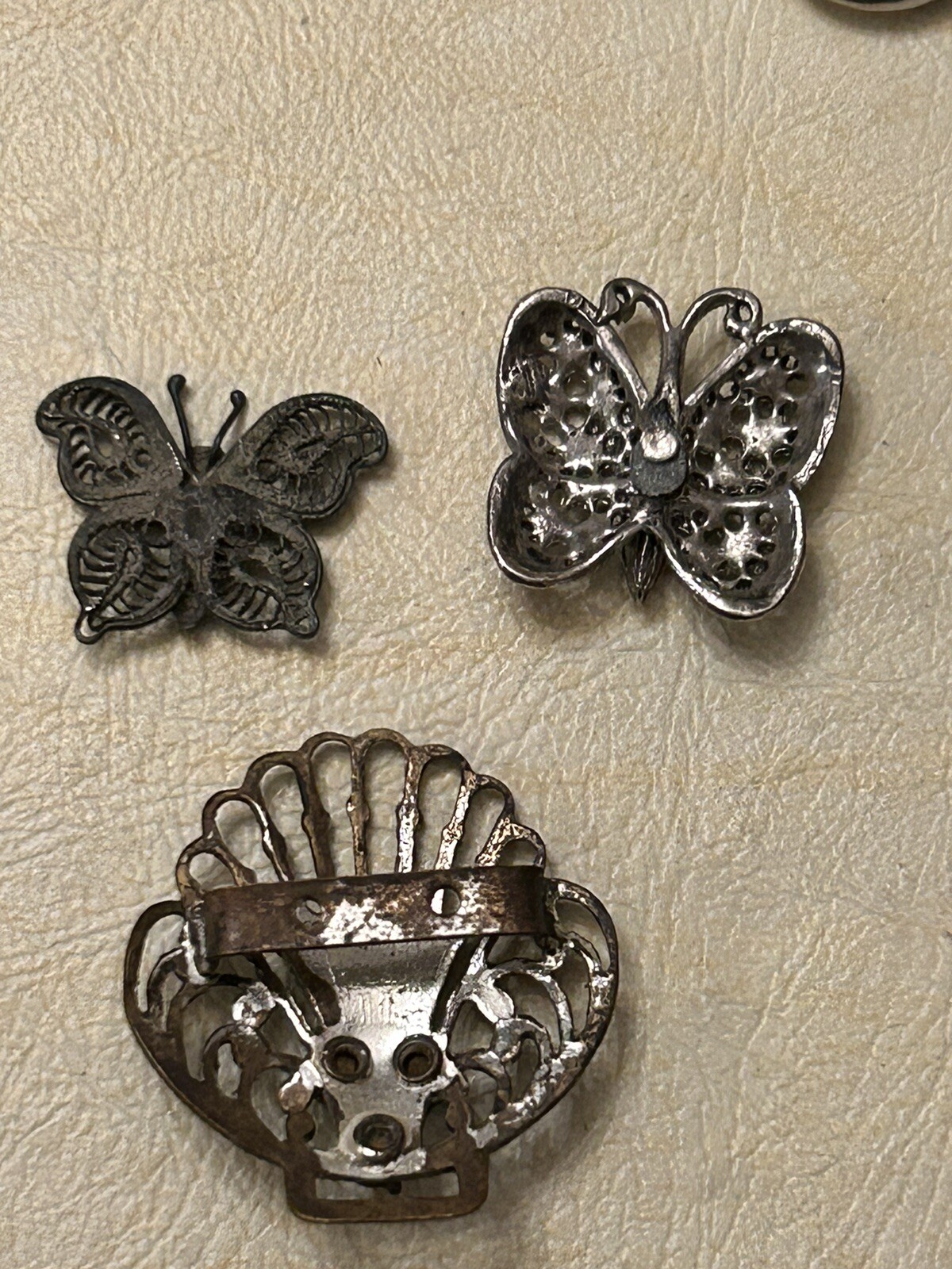 Vintage random filigree metal butterfly’s and sea shell unknown use?