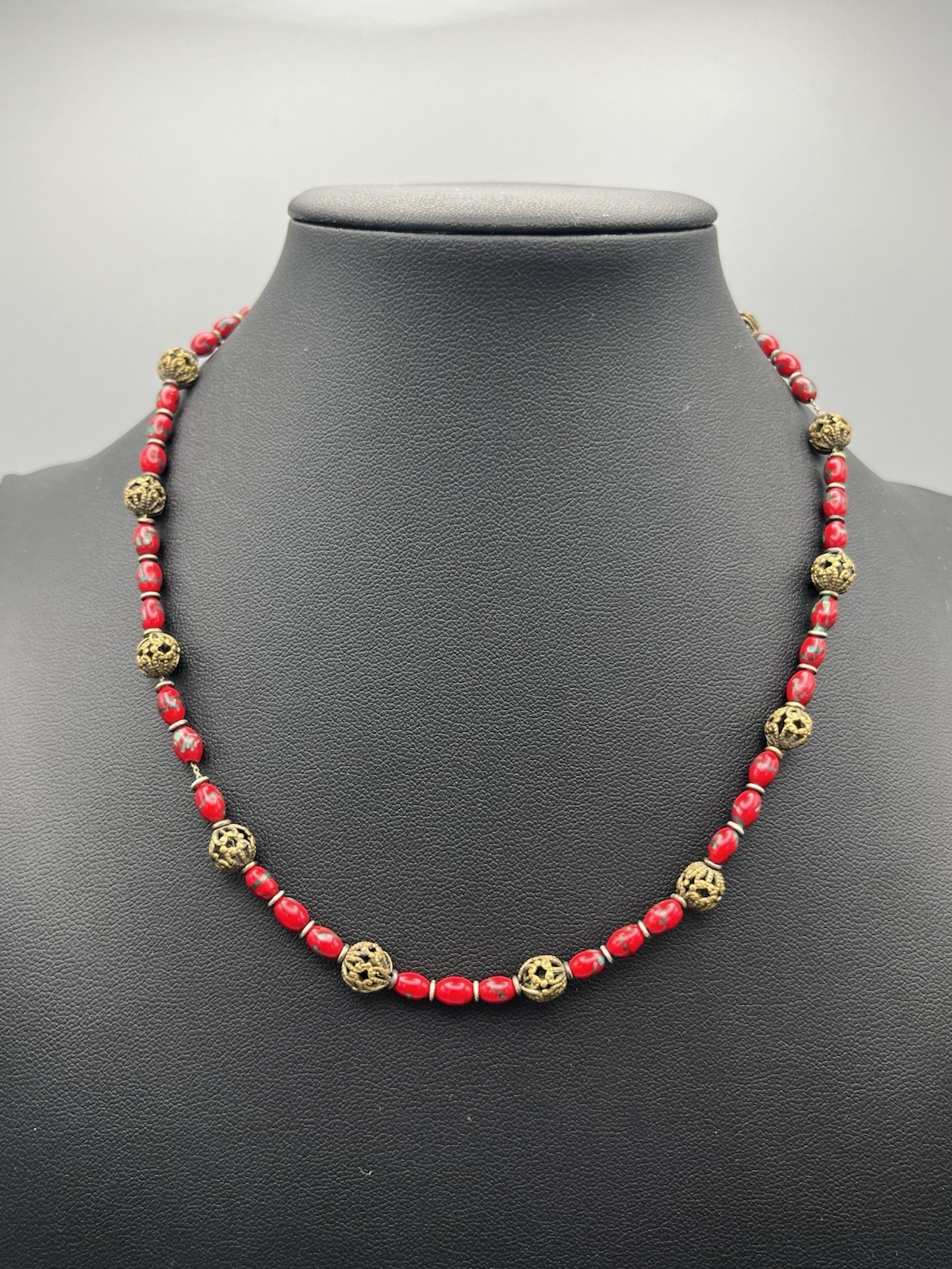 Vintage Red Glass Bead Necklace with Ornate Brass Filigree Accents