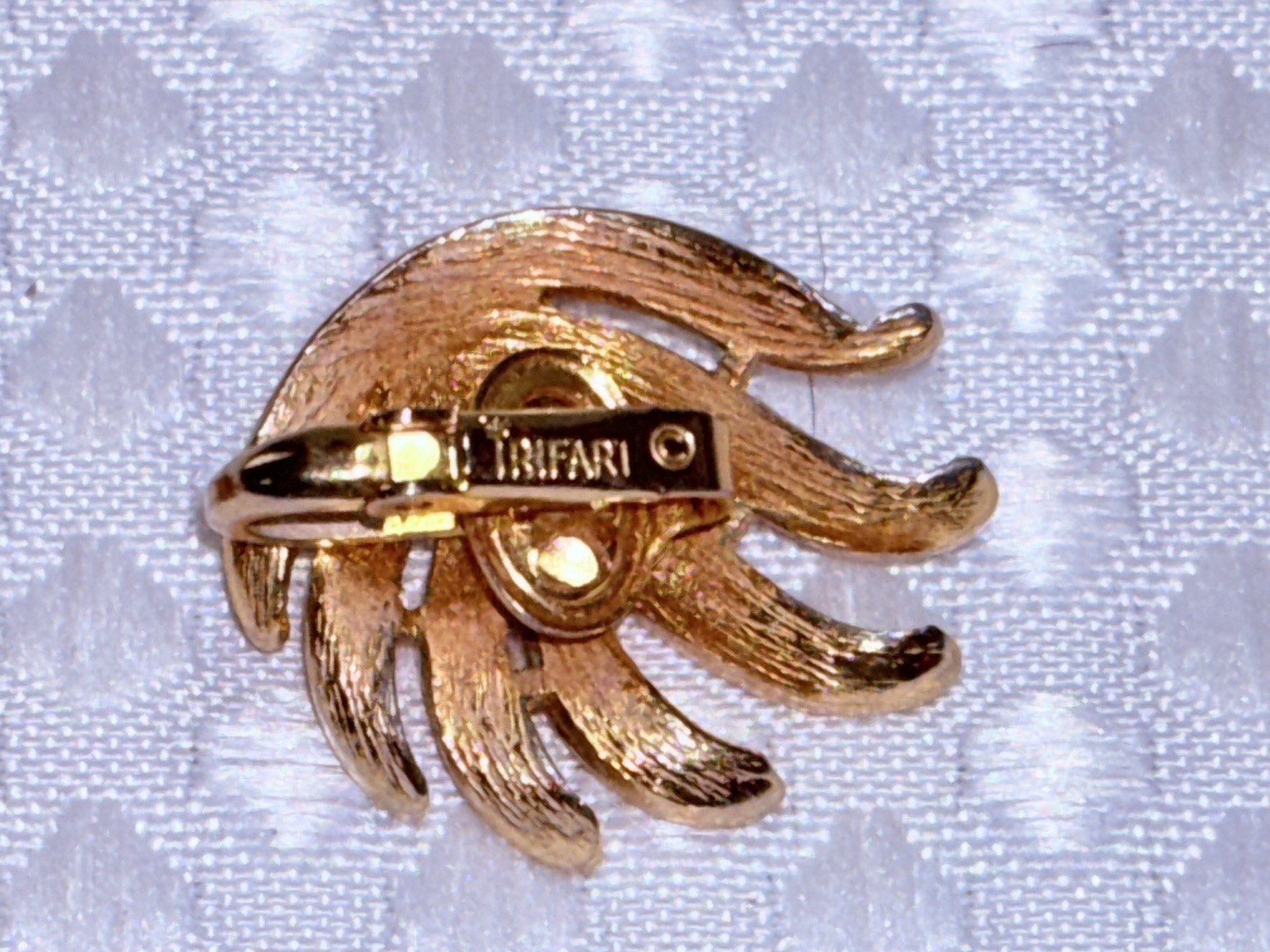Vintage Crown Trifari brushed gold tone finish leaf clip-on earrings