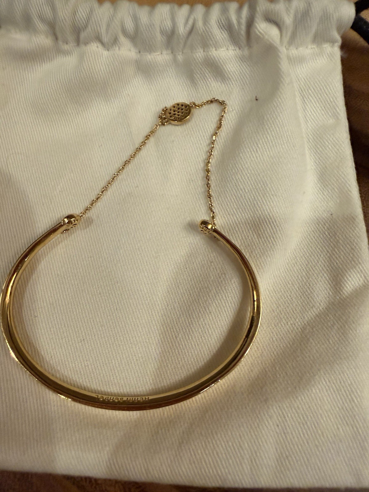 Henri bendel Gold Plated Petite Bangle Bracelet Blue Crystal Charm Safety Clasp