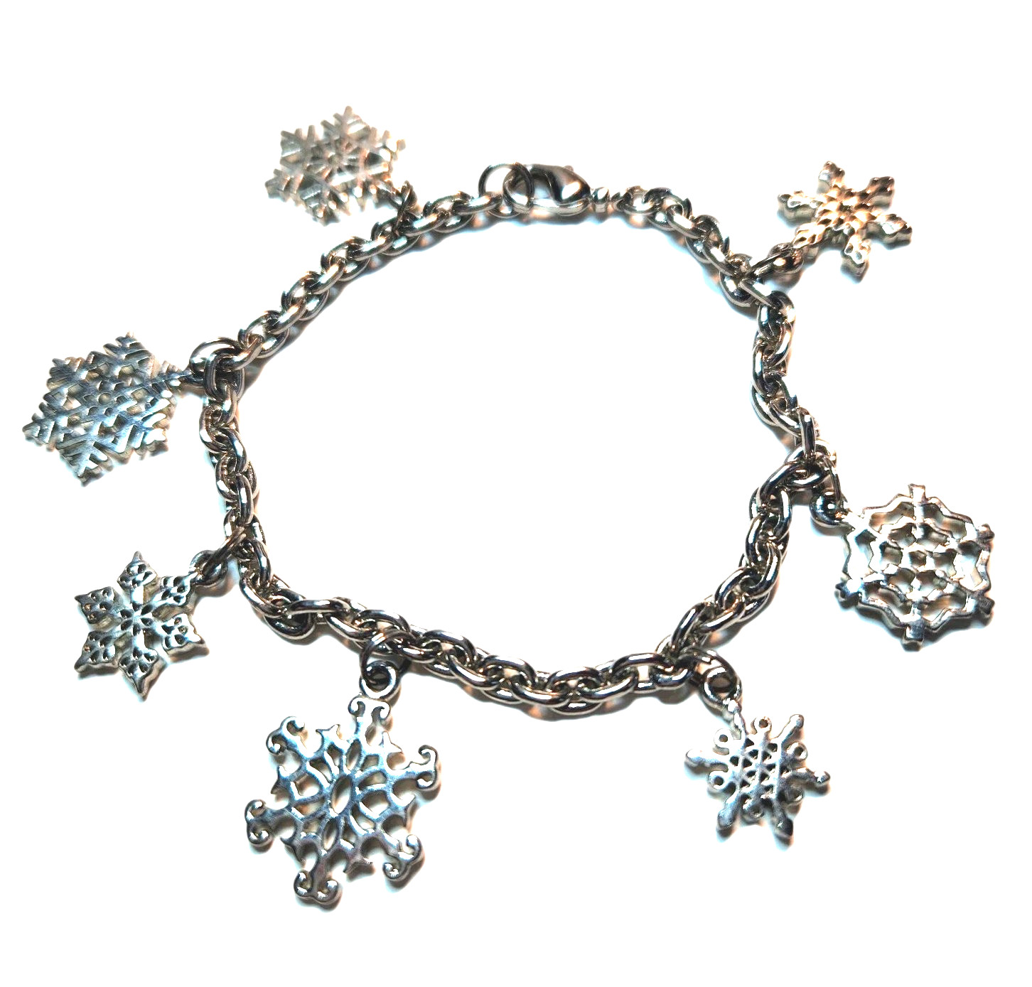 Vintage Bracelet 7 Snowflake Charms Silvertone 7.5″ Lobster Clasp Non- Magnetic