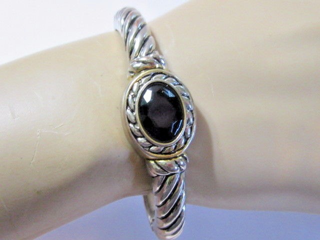 SILVER TONE SCALLOPED CARVED METAL WITH BLACK CABOCHON HINGED CLAMPER BRACELET
