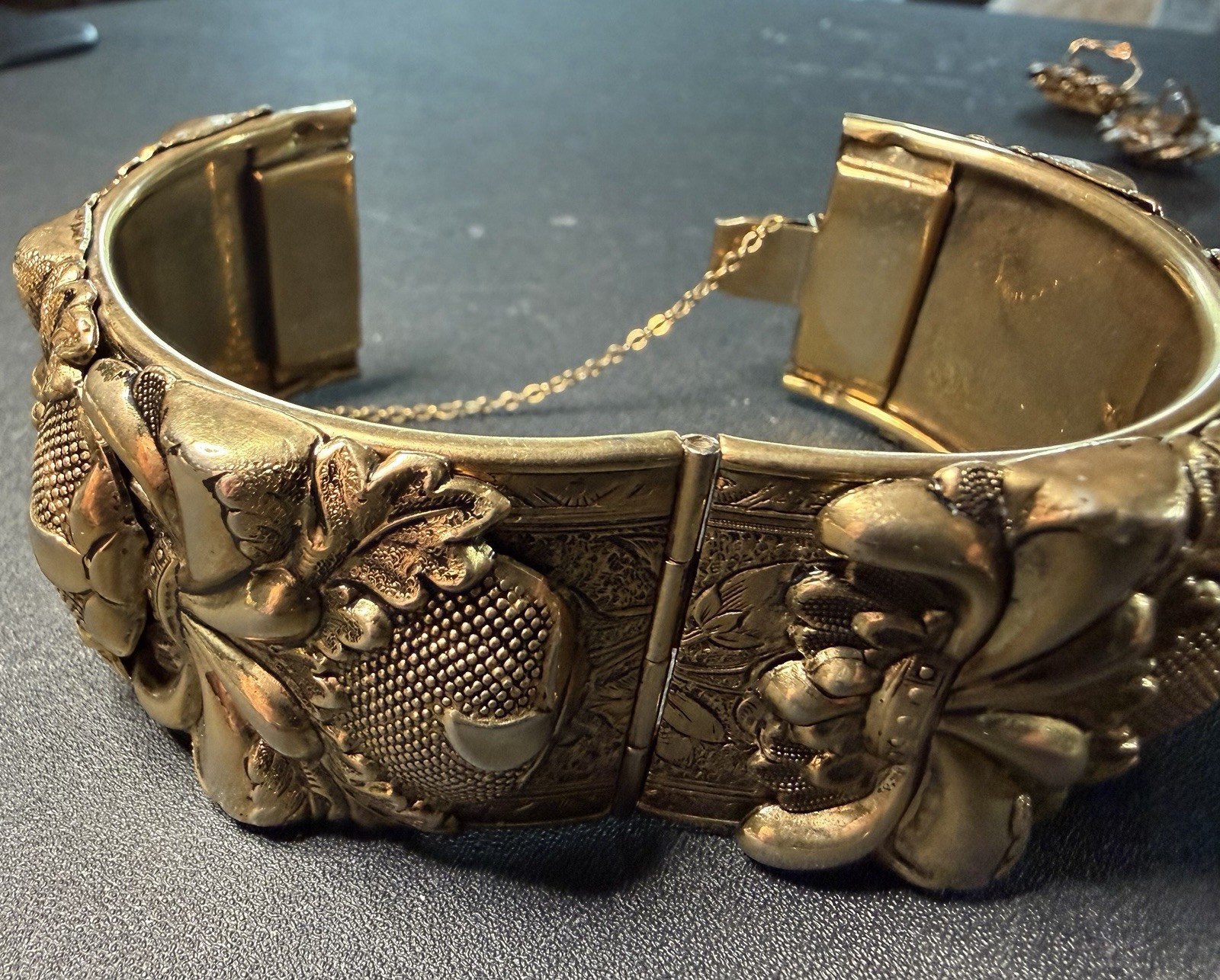 Vintage Vargas Gold Tone Wide Hinged Bracelet Floral Raised Design Safety Chain